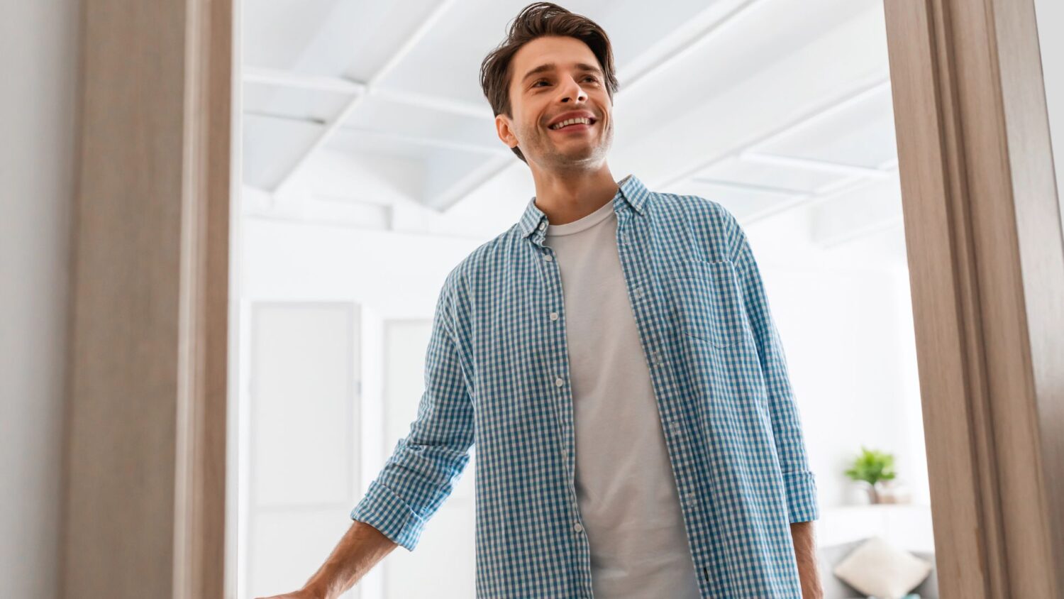 Individual entering a sober living home for addiction recovery